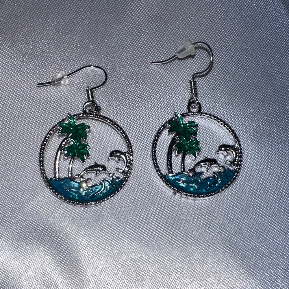 Silver Palm Tree And dolphin earrings NWOTS